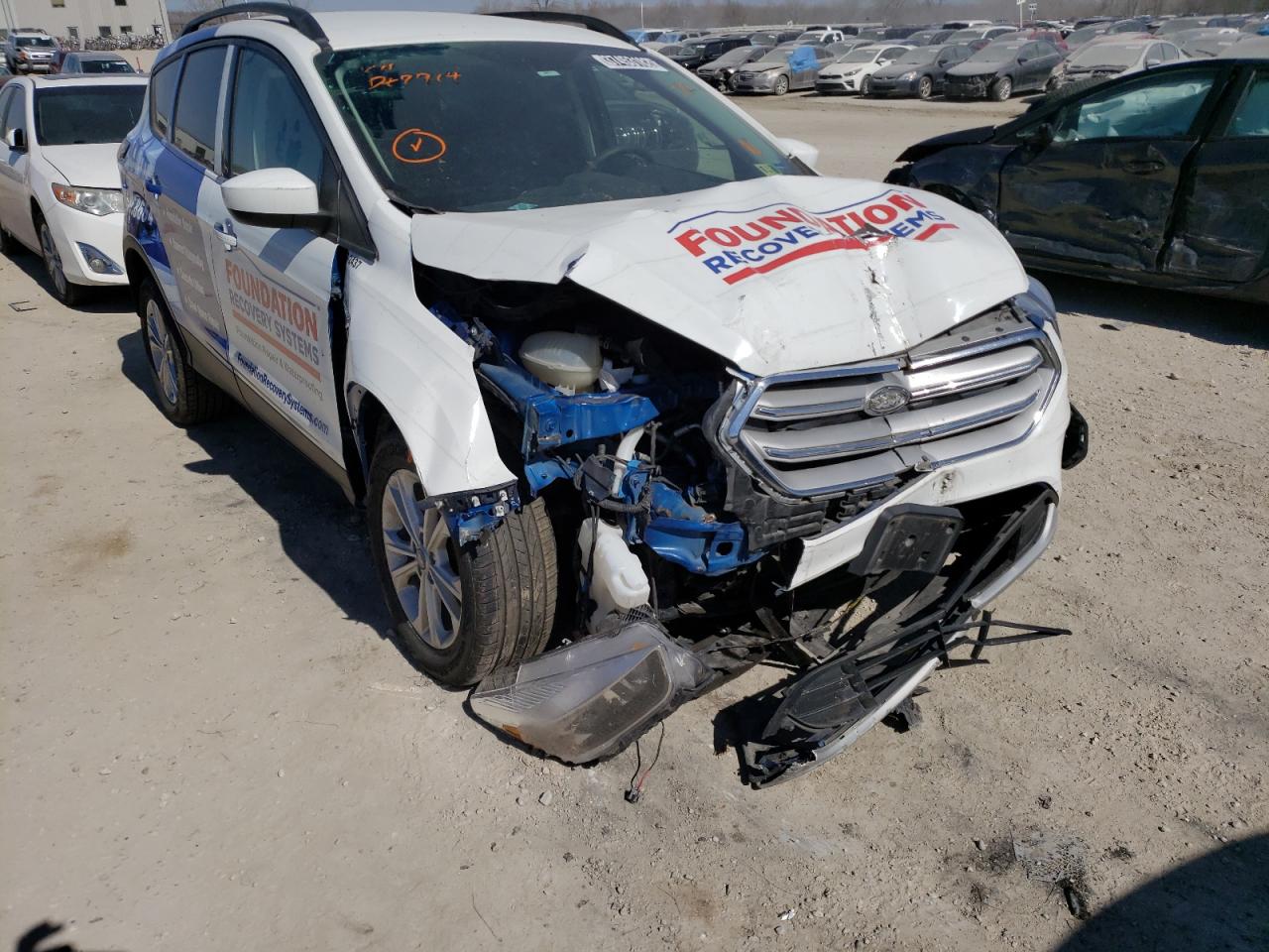 Photo 9 from auction – 2018 FORD ESCAPE SE with VIN 1FMCU0GD7JUD47714
