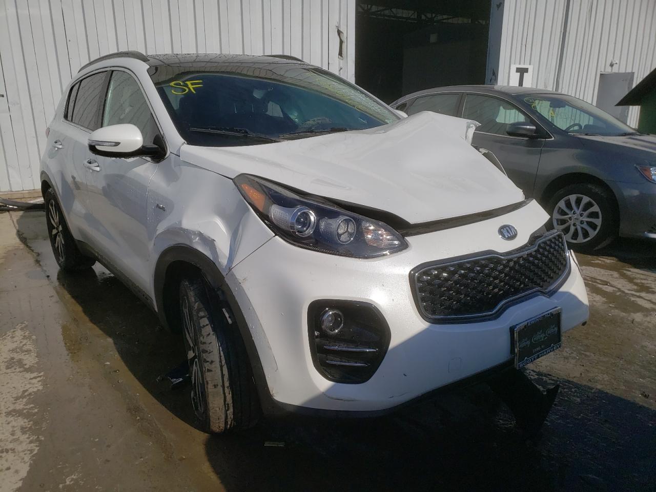 KIA SPORTAGE E 2019 with VIN KNDPNCAC1K7501094 - Photo from auction