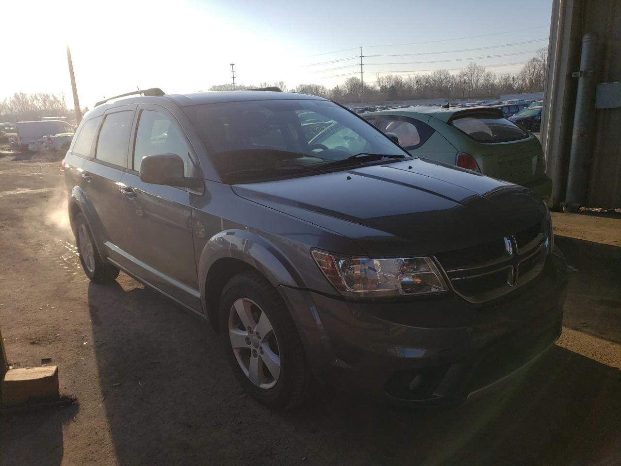 DODGE JOURNEY SX 2012 with VIN 3C4PDDBG2CT220803 - Photo from auction