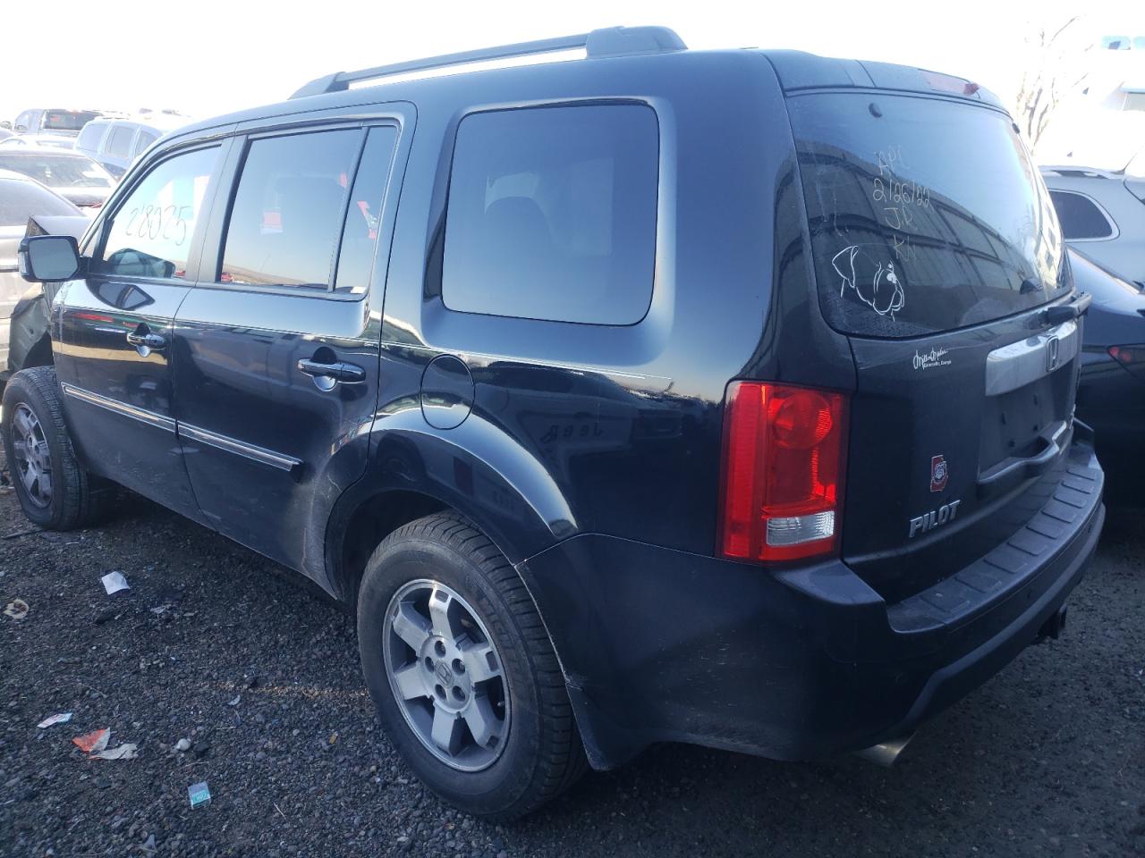 Photo 3 from auction – 2011 HONDA PILOT TOUR with VIN 5FNYF4H94BB041201
