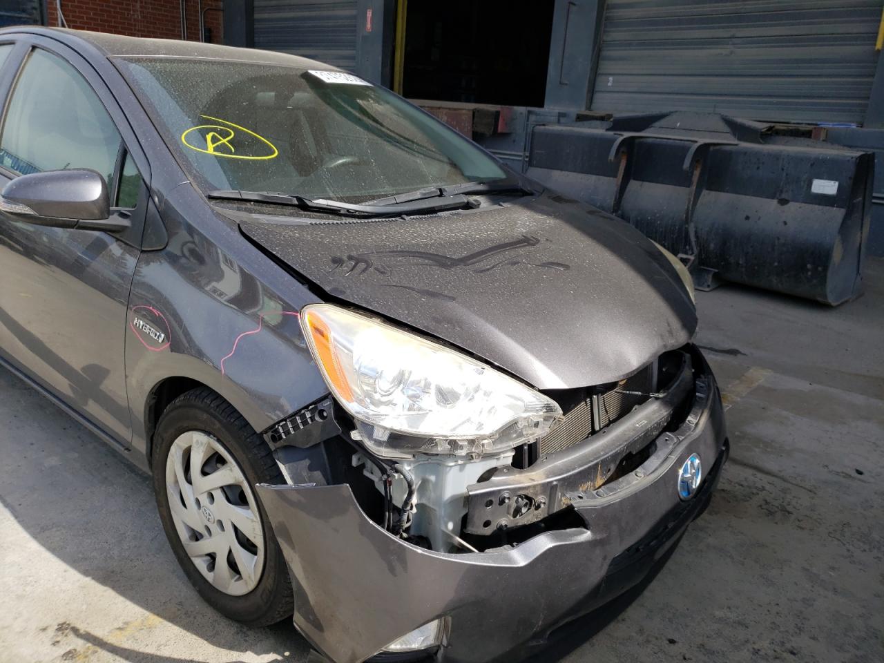 Photo 9 from auction – 2014 TOYOTA PRIUS C with VIN JTDKDTB39E1060706