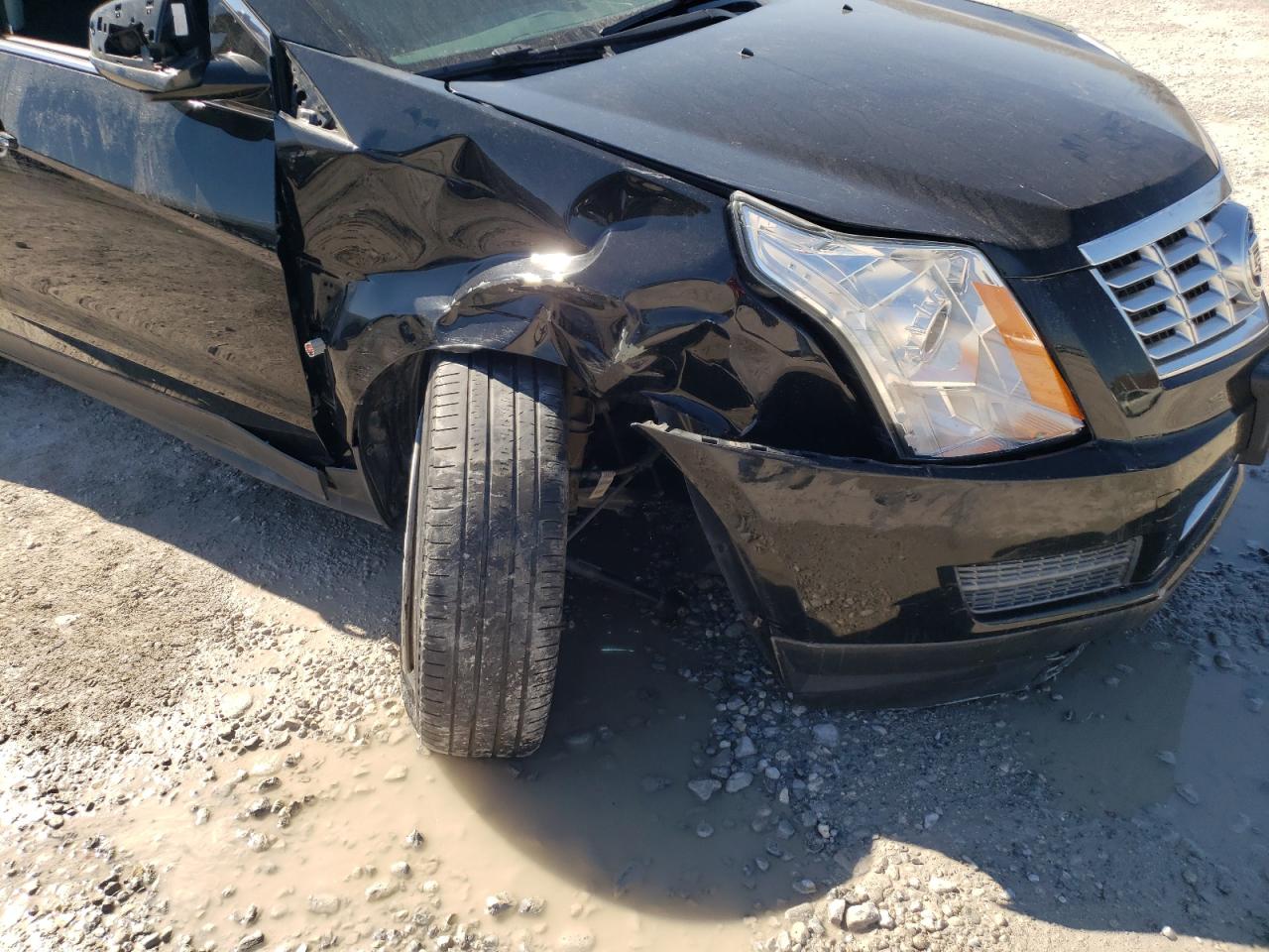 Photo 9 from auction – 2014 CADILLAC SRX with VIN 3GYFNAE37ES688075