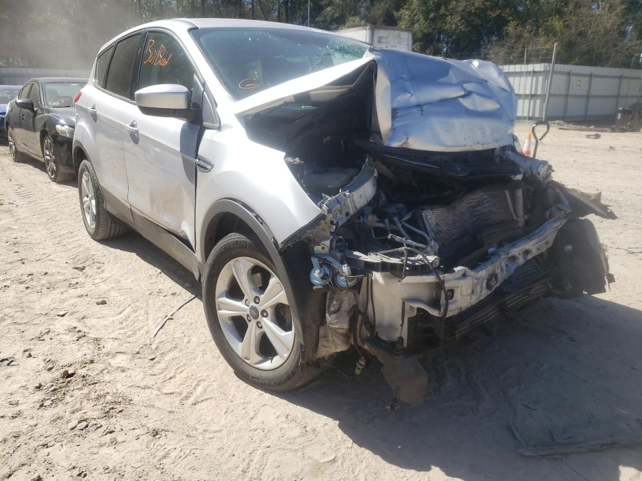 FORD ESCAPE SE 2016 with VIN 1FMCU0GX6GUB09002 - Photo from auction