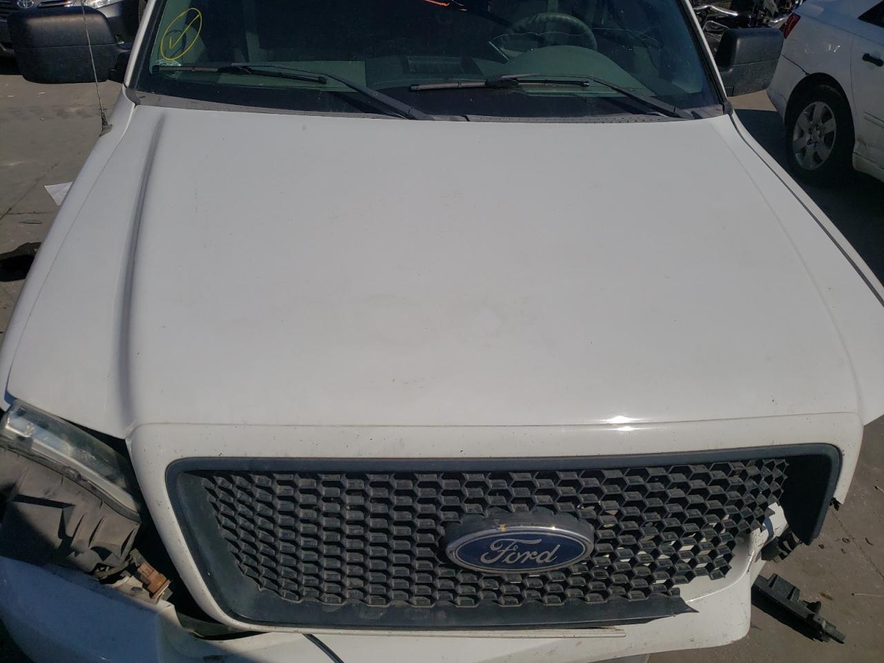Photo 7 from auction – 2004 FORD F150 with VIN 1FTRX12W54NB76271