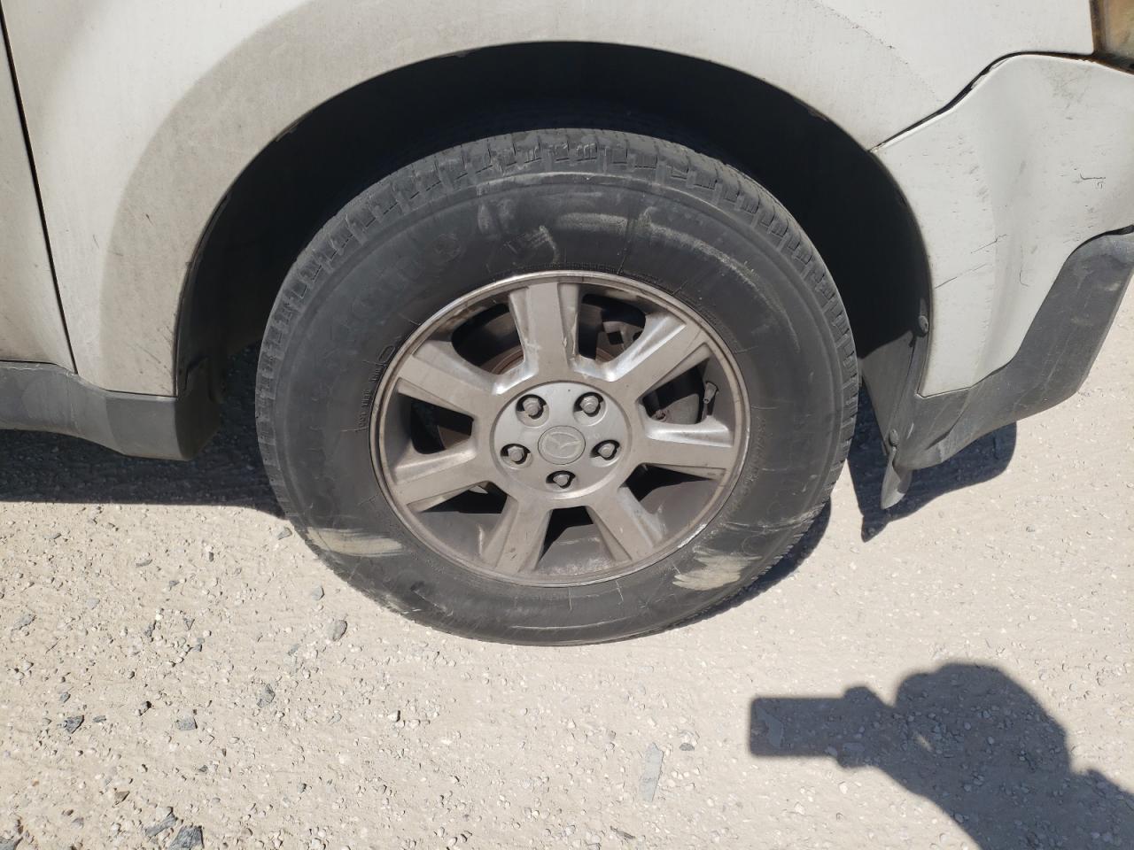 Photo 9 from auction – 2011 MAZDA TRIBUTE I with VIN 4F2CY0C79BKM07739