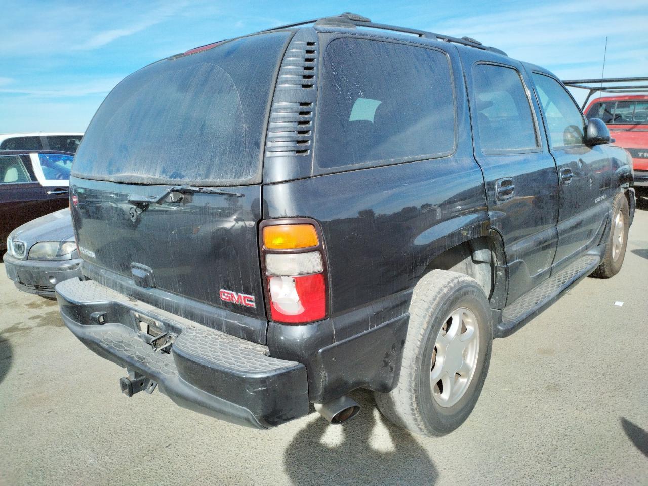 Photo 4 from auction – 2004 GMC YUKON DENA with VIN 1GKEK63U64J230499
