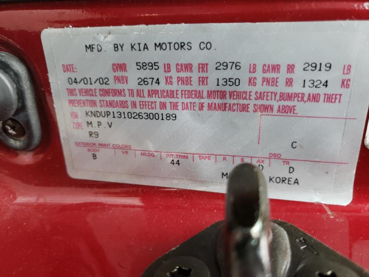 Photo 10 from auction – 2002 KIA SEDONA EX with VIN KNDUP131026300189