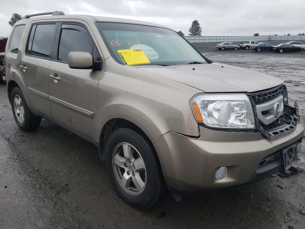 HONDA PILOT EX 2011 with VIN 5FNYF4H41BB094572 - Photo from auction