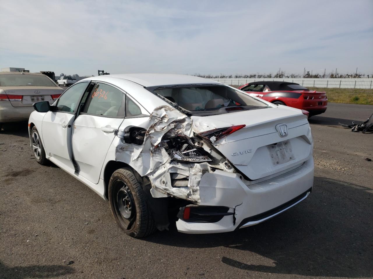 Photo 3 from auction – 2019 HONDA CIVIC LX with VIN 19XFC2F61KE201862