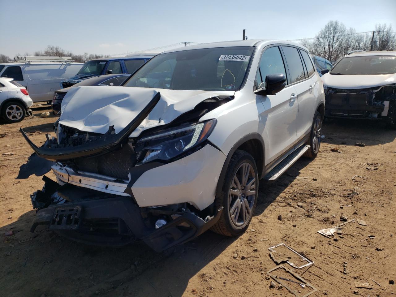 Photo 2 from auction – 2020 HONDA PASSPORT E with VIN 5FNYF8H52LB020689