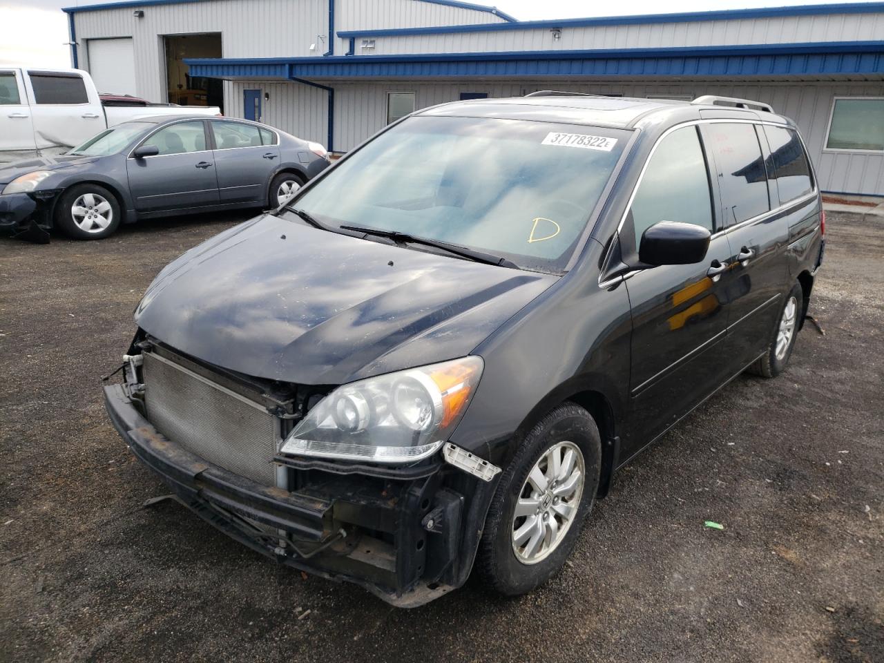 Photo 2 from auction – 2010 HONDA ODYSSEY EX with VIN 5FNRL3H77AB087450