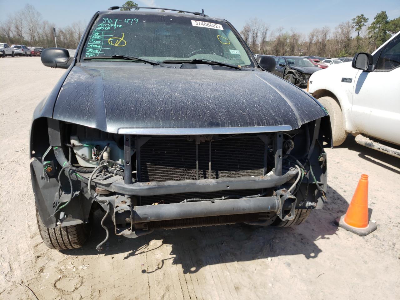 Photo 9 from auction – 2006 GMC ENVOY with VIN 1GKDS13S562151884