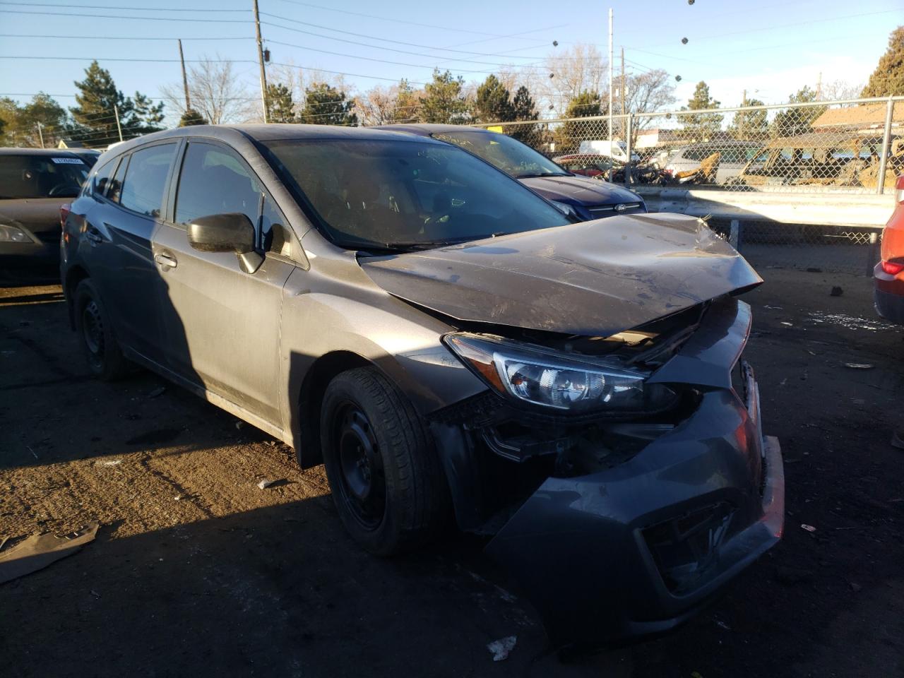 SUBARU IMPREZA 2019 with VIN 4S3GTAA66K3720810 - Photo from auction