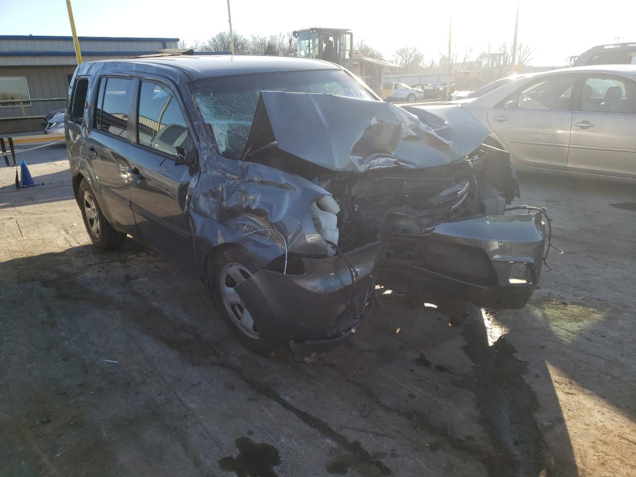 HONDA PILOT LX 2012 with VIN 5FNYF3H22CB003352 - Photo from auction