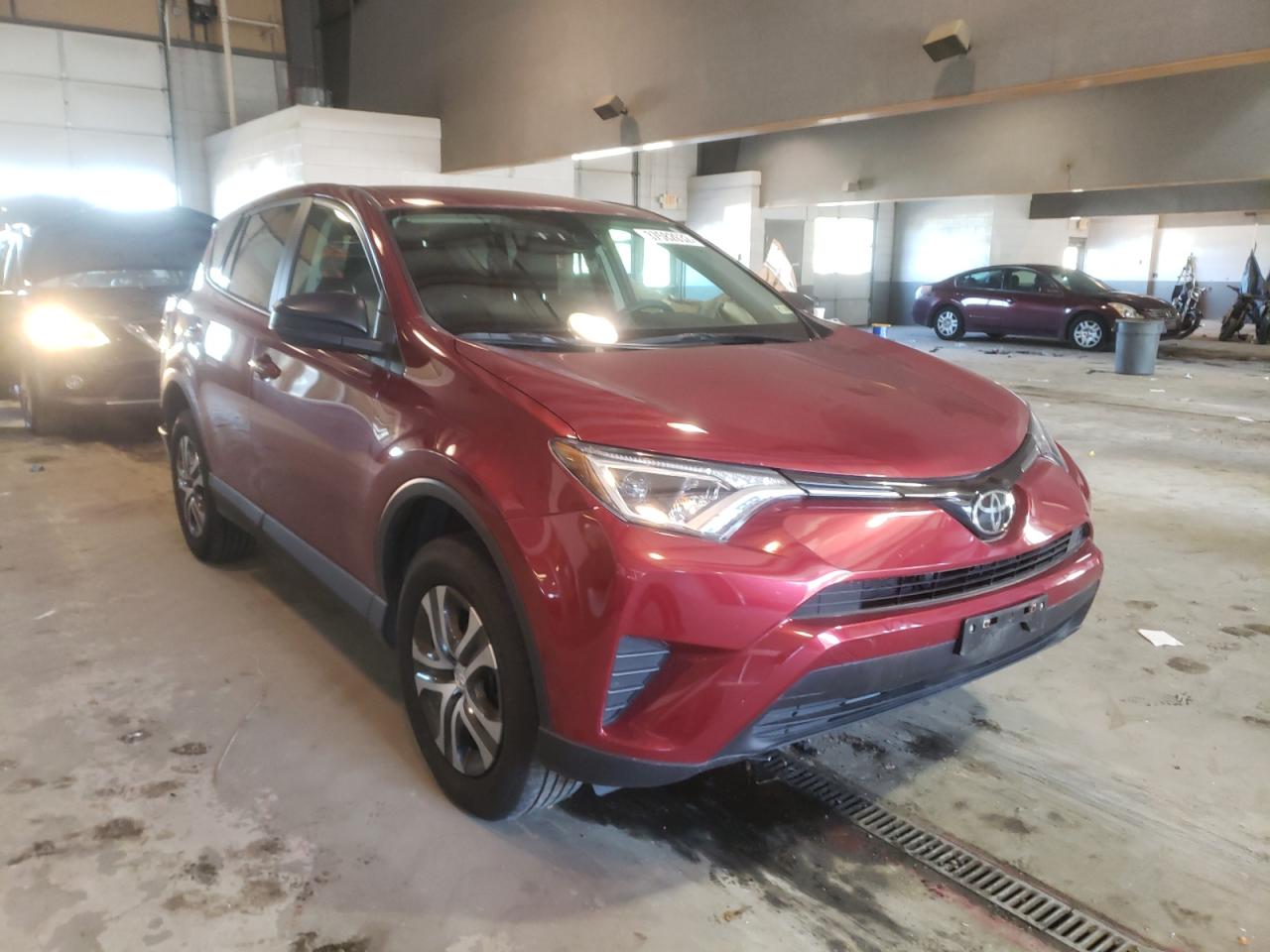 TOYOTA RAV4 LE 2018 with VIN 2T3BFREV4JW714436 - Photo from auction