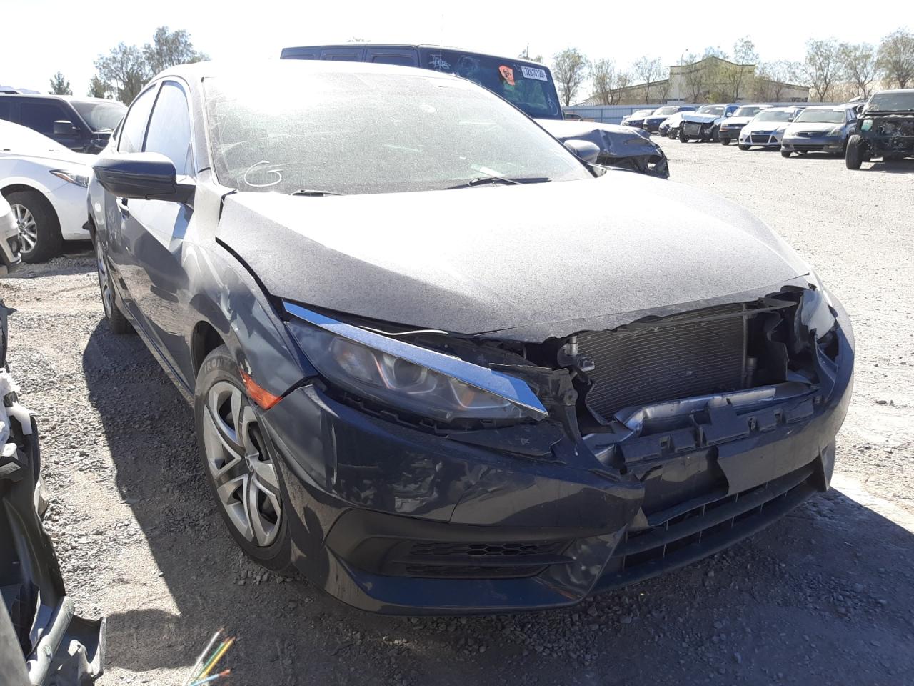 HONDA CIVIC LX 2017 with VIN 19XFC2F5XHE000493 - Photo from auction