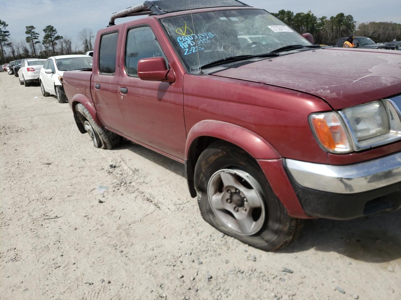 Photo 9 from auction – 2000 NISSAN FRONTIER C with VIN 1N6ED27T3YC401152