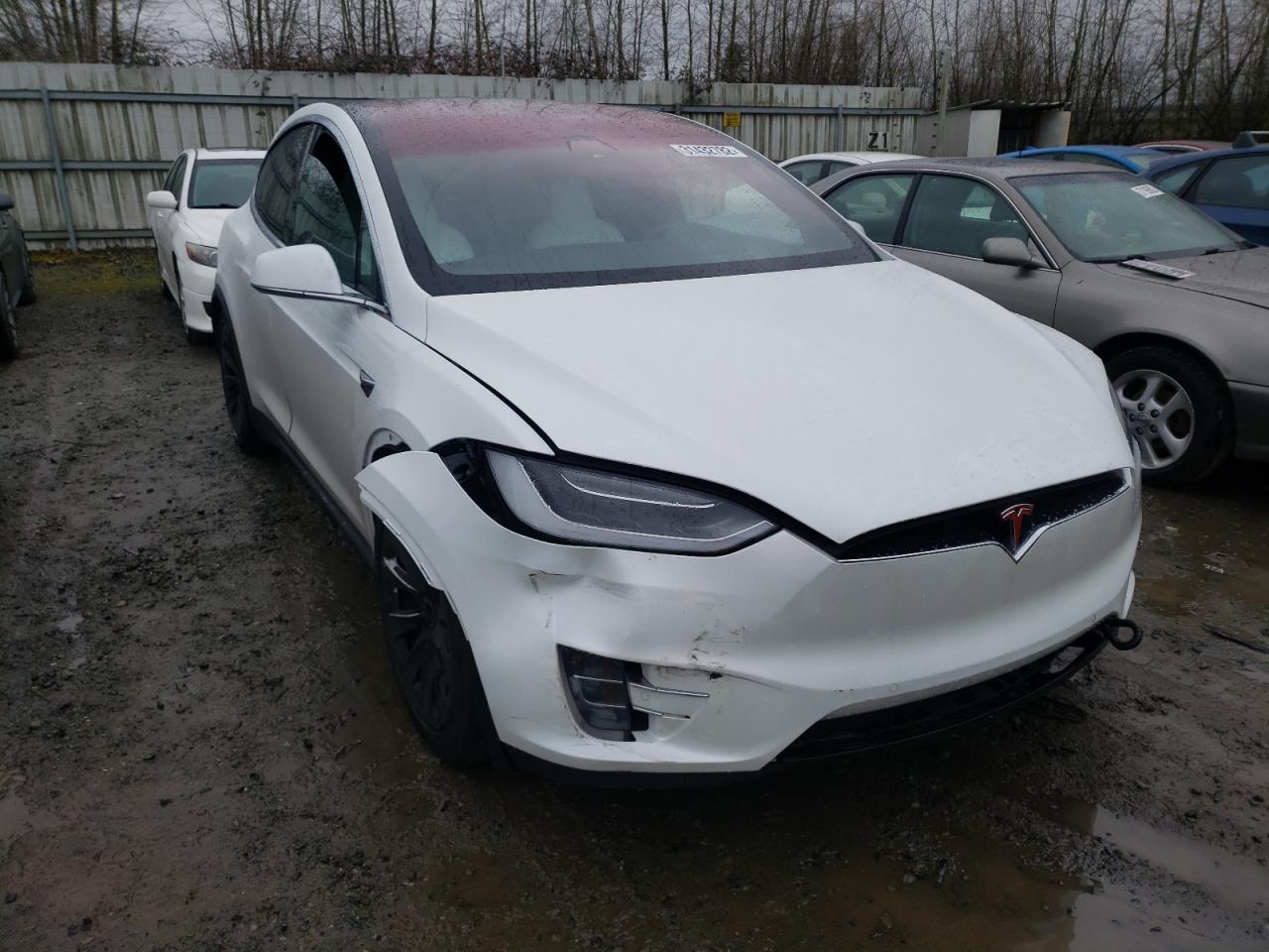 TESLA MODEL X 2017 with VIN 5YJXCBE28HF049472 - Photo from auction