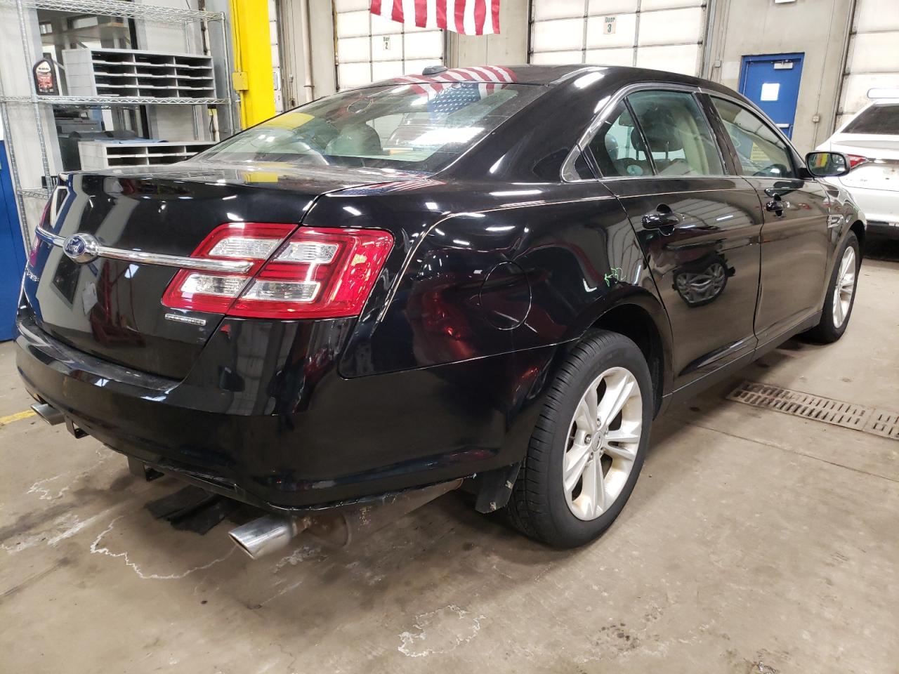 Photo 4 from auction – 2016 FORD TAURUS SE with VIN 1FAHP2D82GG105706