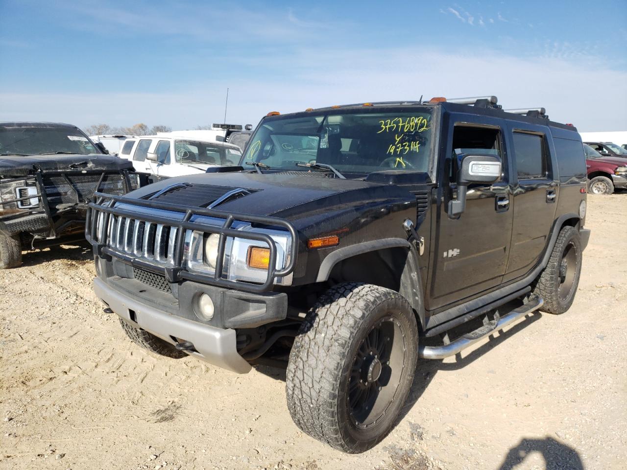Photo 2 from auction – 2009 HUMMER H2 LUXURY with VIN 5GRGN83289H100730
