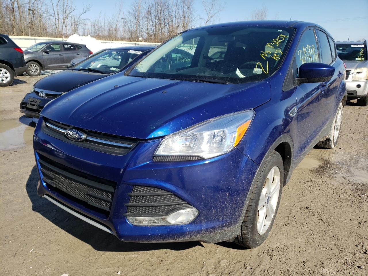 Photo 2 from auction – 2014 FORD ESCAPE SE with VIN 1FMCU9GX9EUB09772