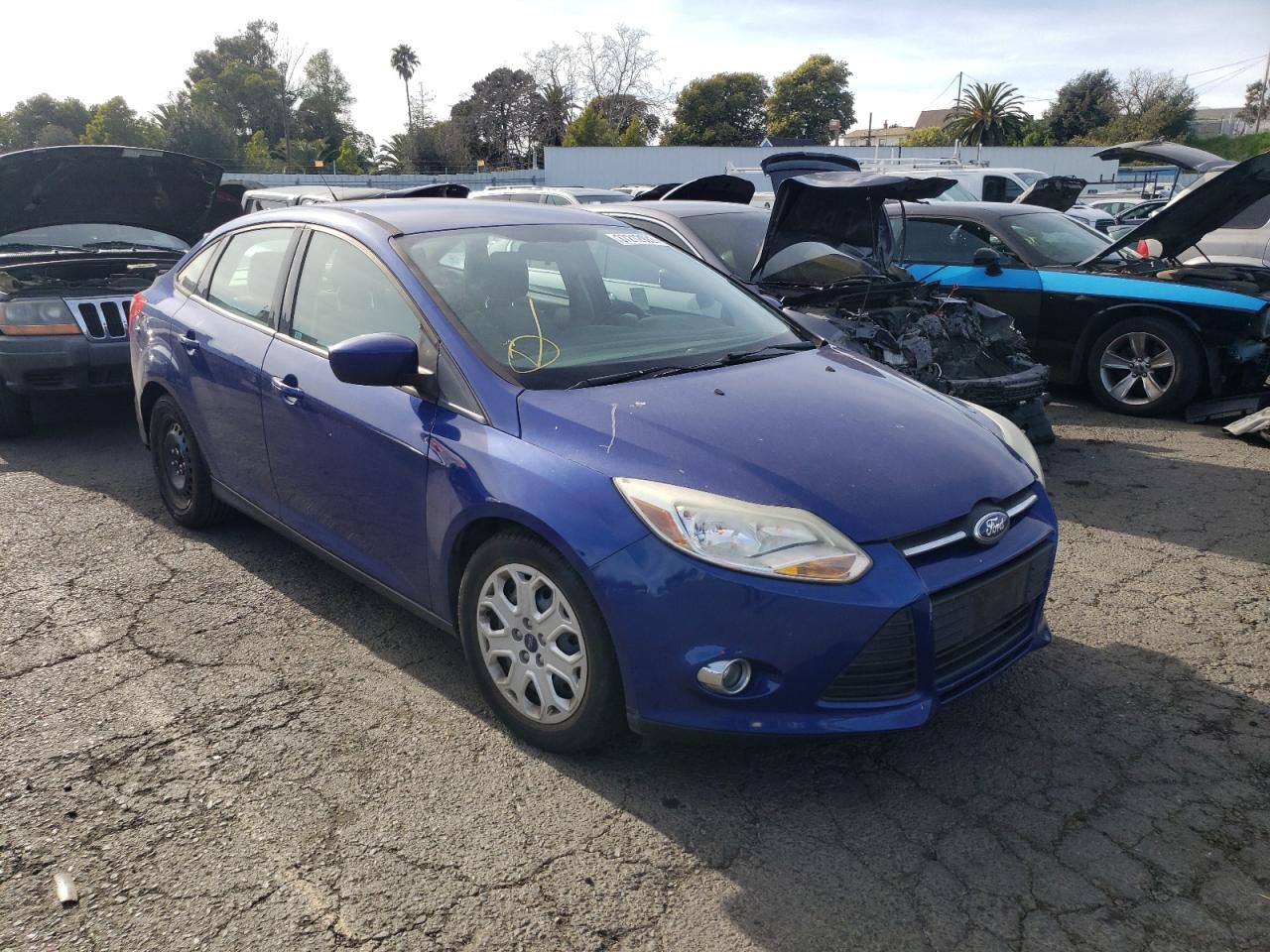 FORD FOCUS 2012 with VIN 1FAHP3F21CL258240 - Photo from auction