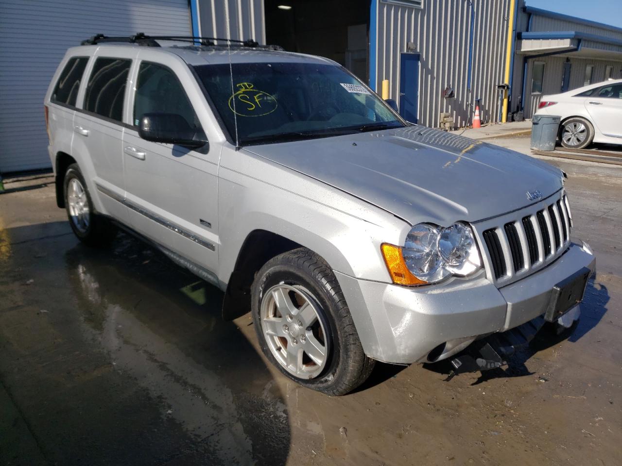 JEEP GRAND CHER 2009 with VIN 1J8GR48K69C556870 - Photo from auction
