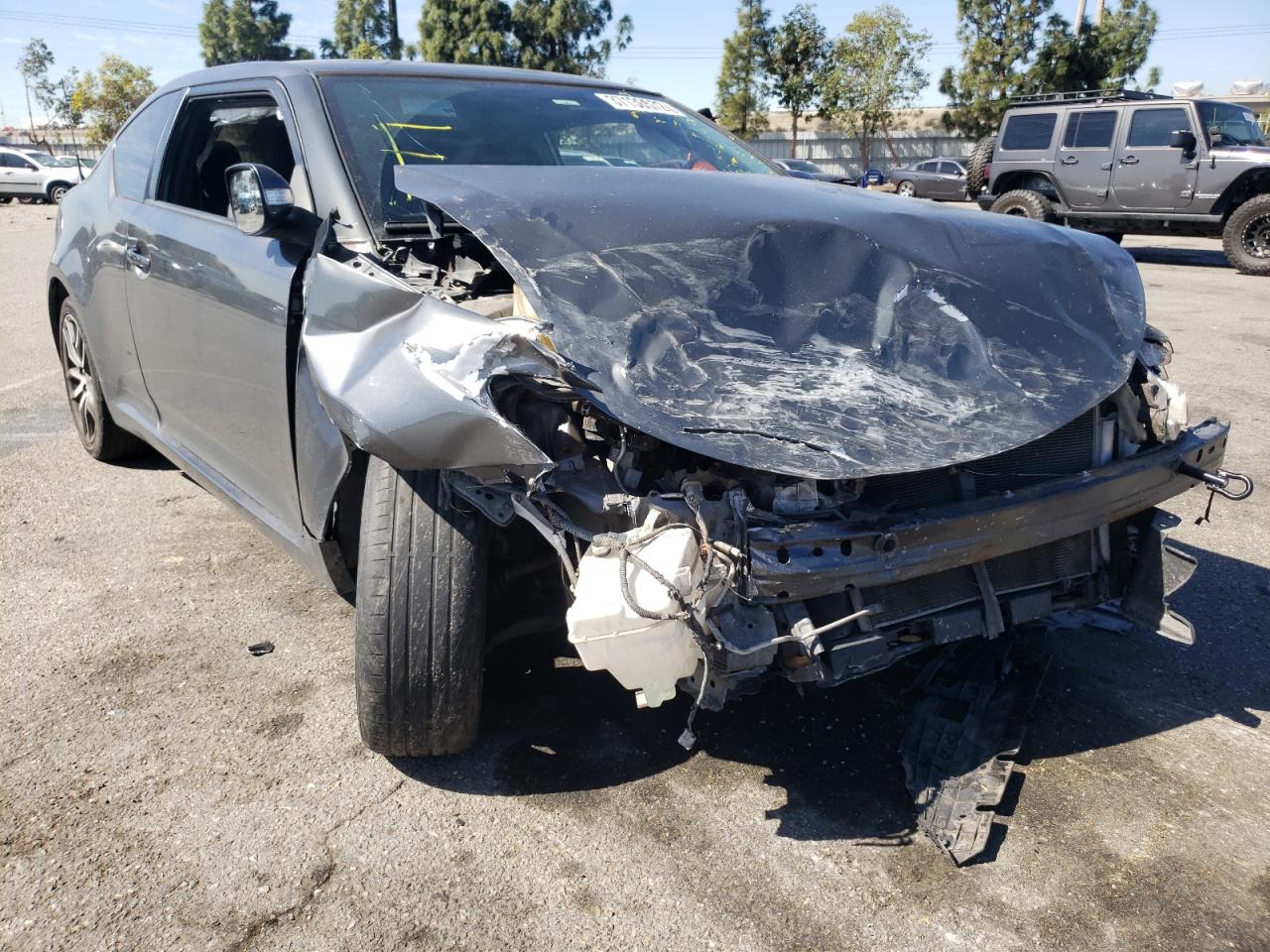 TOYOTA SCION TC 2015 with VIN JTKJF5C71F3090672 - Photo from auction
