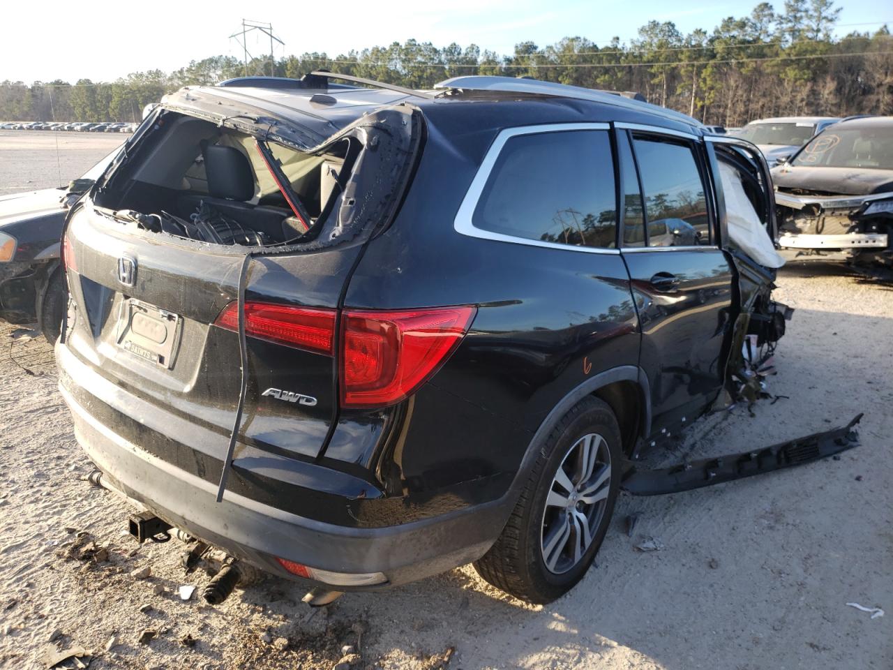 Photo 4 from auction – 2016 HONDA PILOT EXLN with VIN 5FNYF6H78GB019722