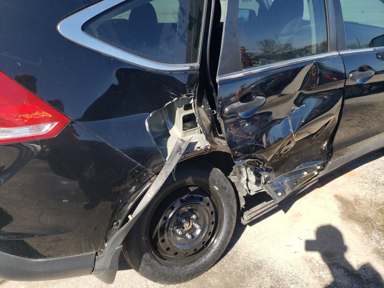 Photo 9 from auction – 2014 HONDA CR-V LX with VIN 2HKRM4H33EH653627