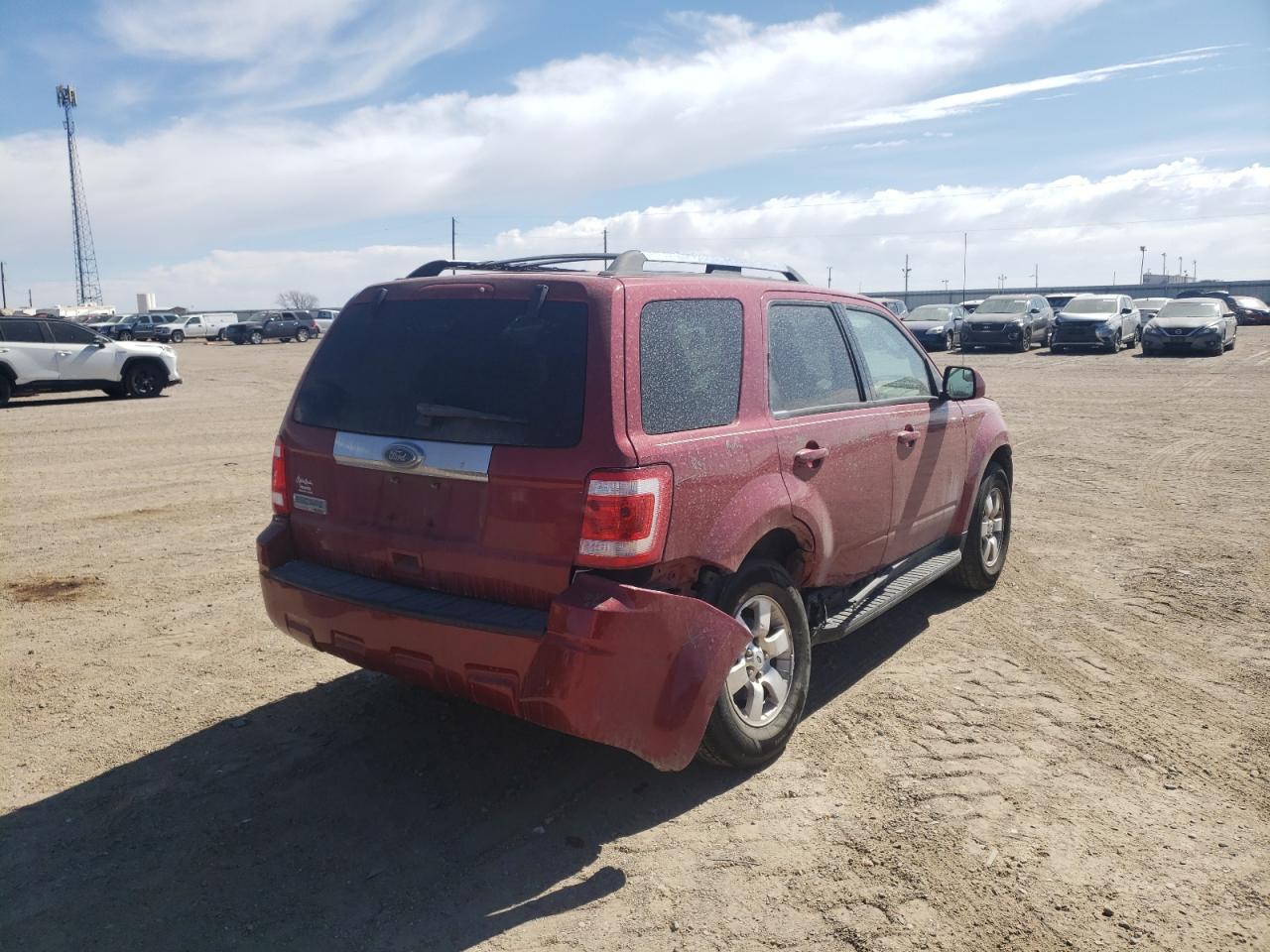 Photo 4 from auction – 2010 FORD ESCAPE LIM with VIN 1FMCU0E7XAKB60878