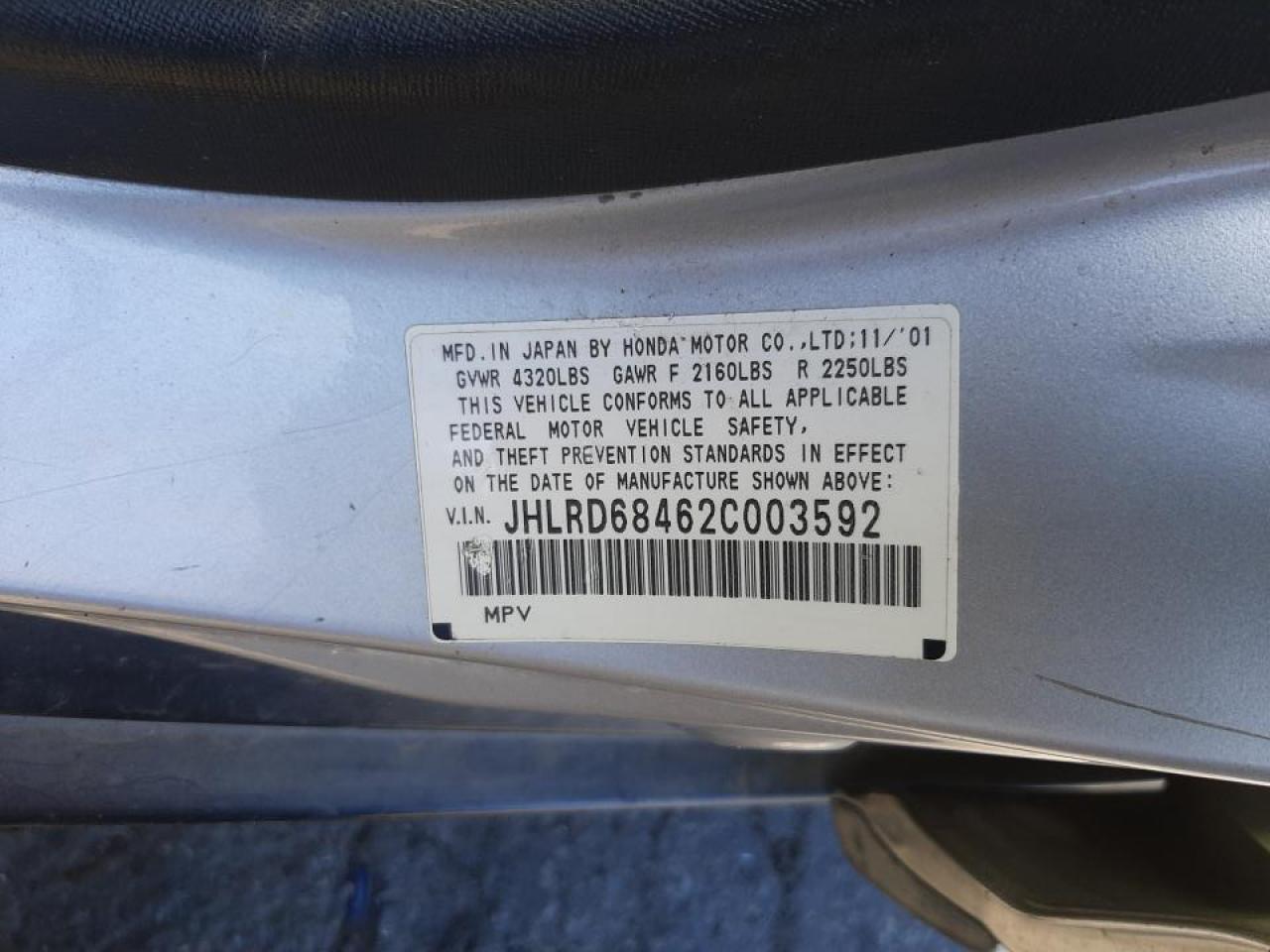 Photo 10 from auction – 2002 HONDA CR-V LX with VIN JHLRD68462C003592