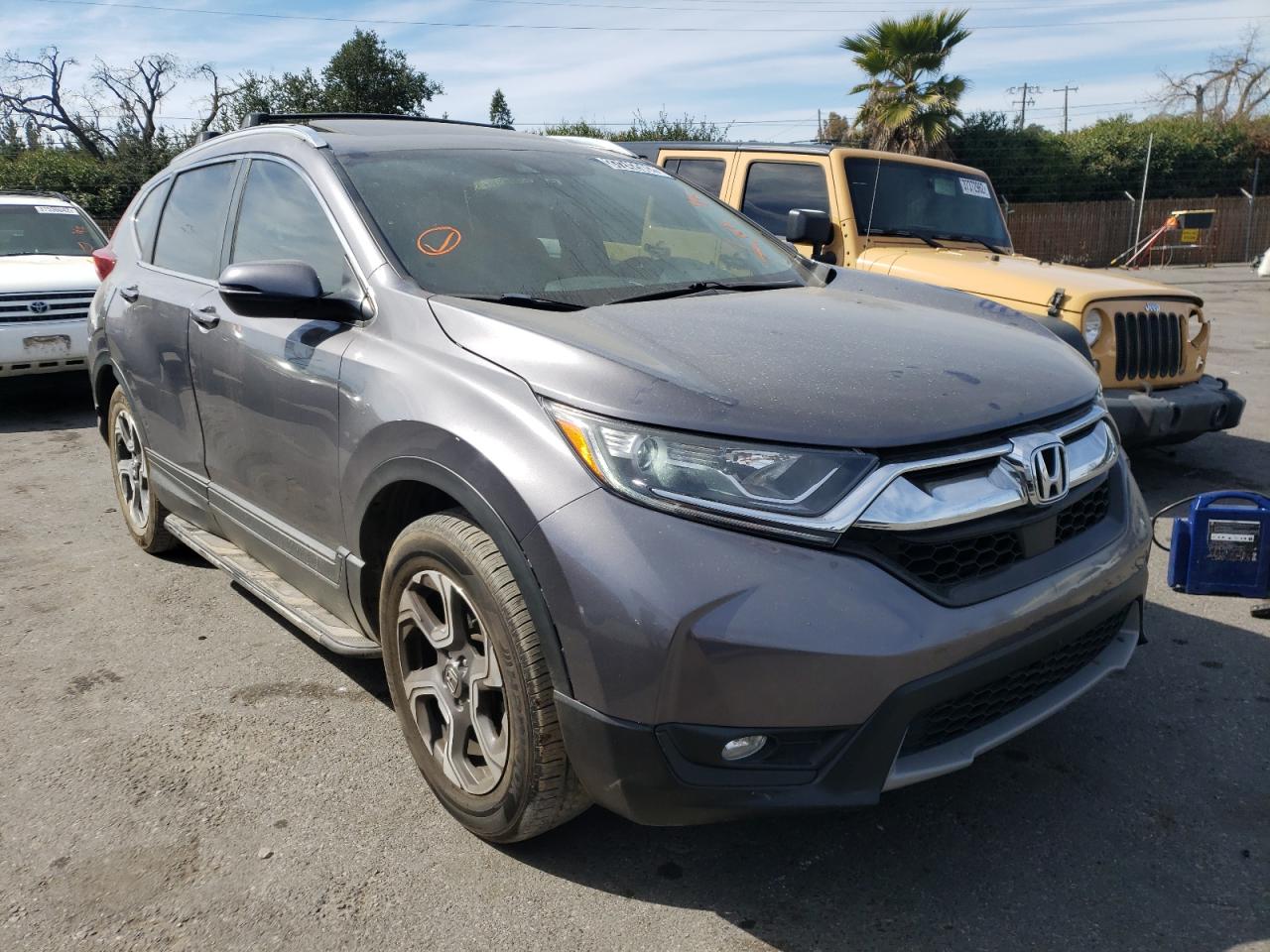 HONDA CR-V EXL 2018 with VIN 7FARW2H89JE024011 - Photo from auction