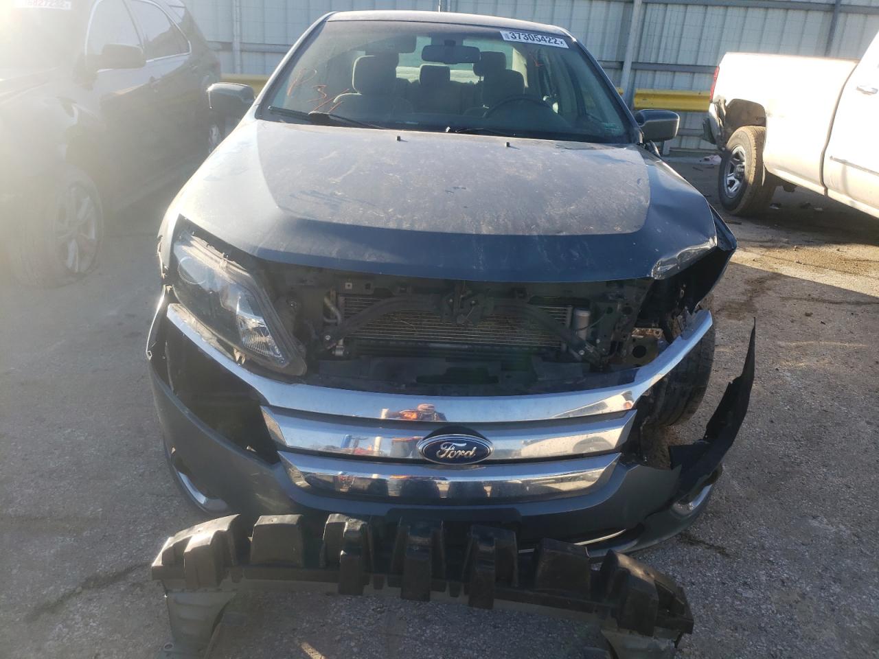 Photo 9 from auction – 2011 FORD FUSION HYB with VIN 3FADP0L39BR335561