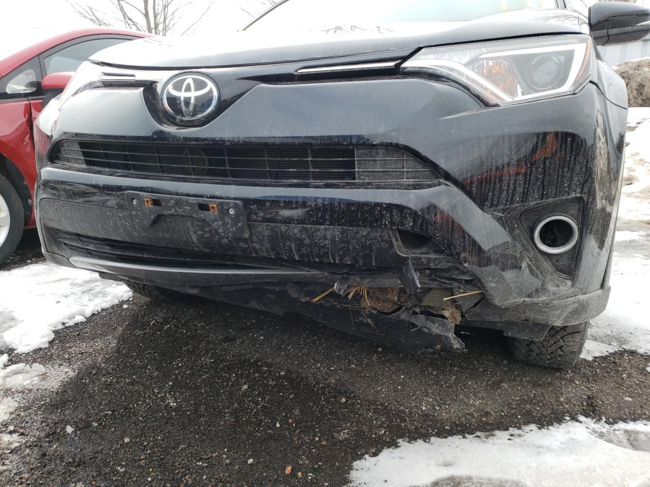 Photo 9 from auction – 2017 TOYOTA RAV4 XLE with VIN 2T3RFREV7HW640177
