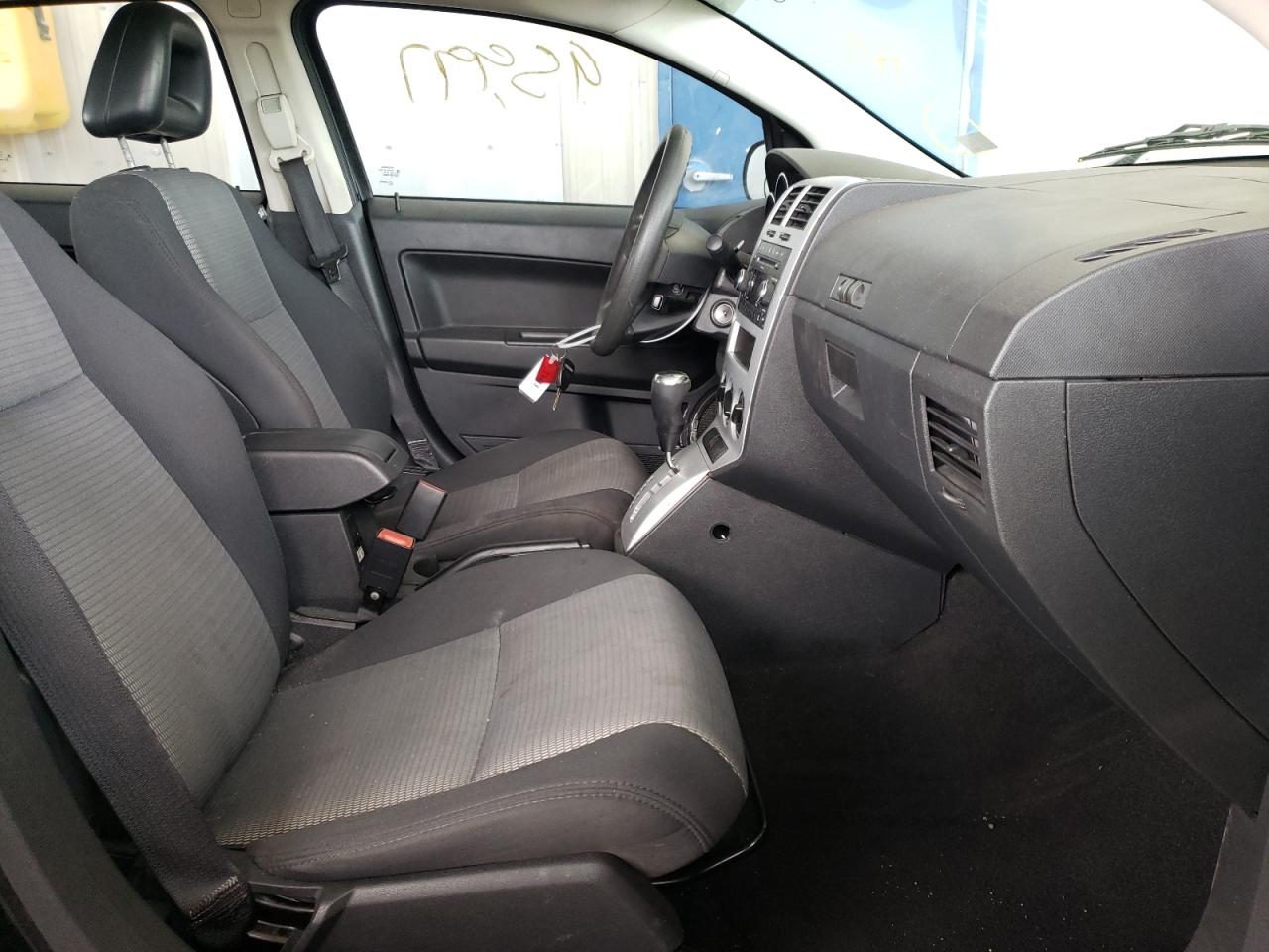 Photo 5 from auction – 2009 DODGE CALIBER SX with VIN 1B3HB48A39D112512