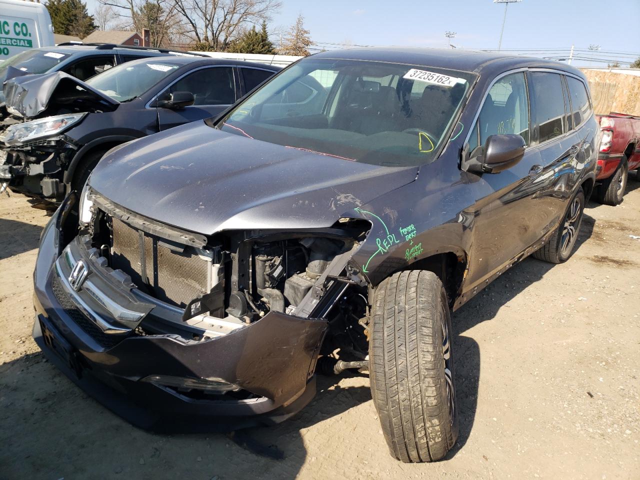 Photo 2 from auction – 2016 HONDA PILOT EXLN with VIN 5FNYF6H73GB101065