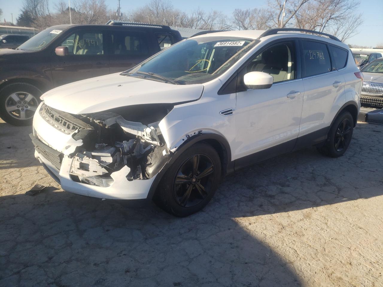 Photo 2 from auction – 2015 FORD ESCAPE SE with VIN 1FMCU9GX4FUA47912