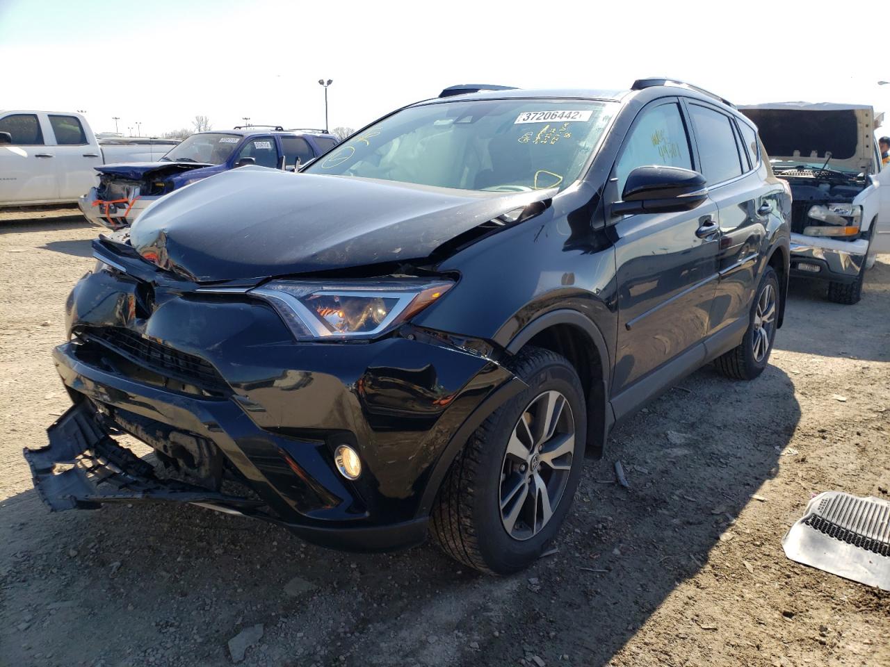 Photo 2 from auction – 2017 TOYOTA RAV4 XLE with VIN 2T3RFREV5HW664171