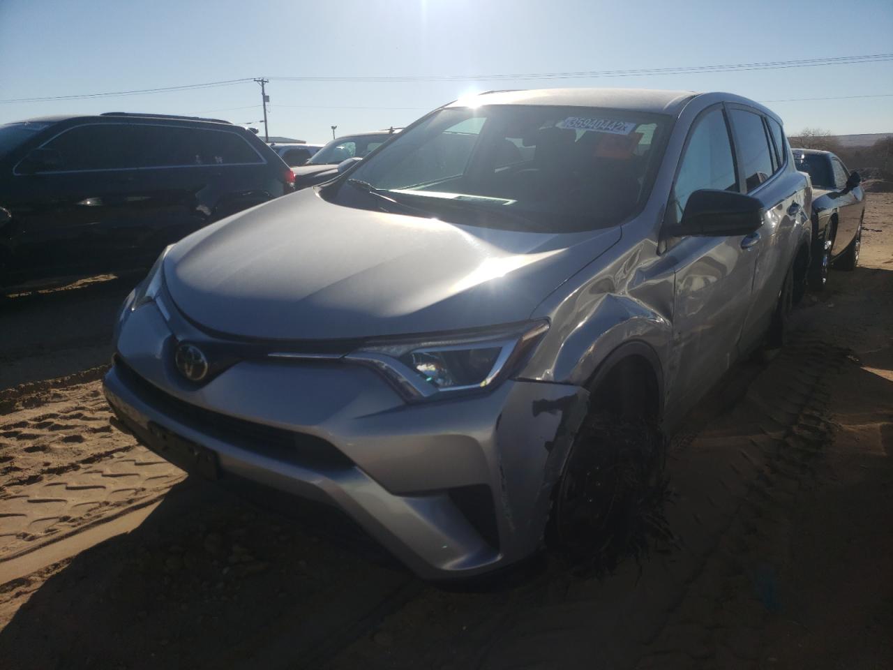 Photo 2 from auction – 2018 TOYOTA RAV4 LE with VIN 2T3BFREV9JW760778