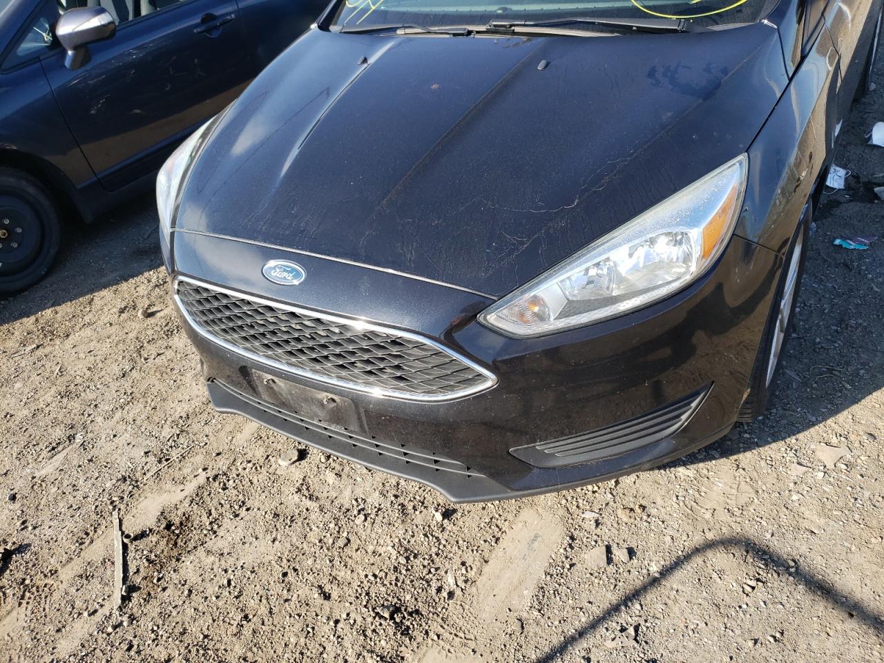 Photo 10 from auction – 2015 FORD FOCUS SE with VIN 1FADP3F22FL325933