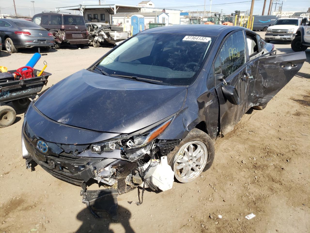 TOYOTA PRIUS PRIM 2021 with VIN JTDKAMFP2M3178451 - Photo from auction