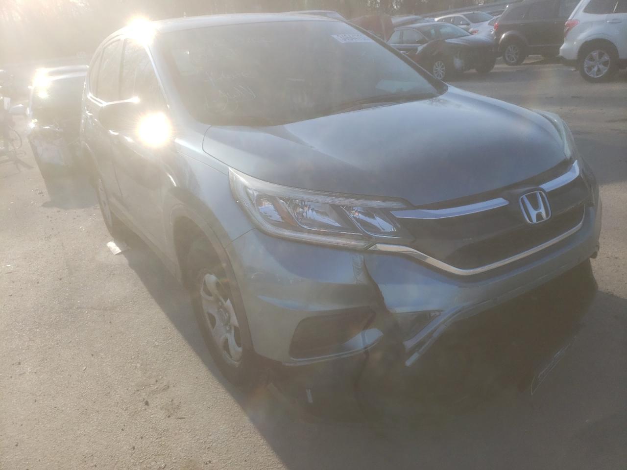 HONDA CR-V LX 2015 with VIN 5J6RM4H33FL017457 - Photo from auction