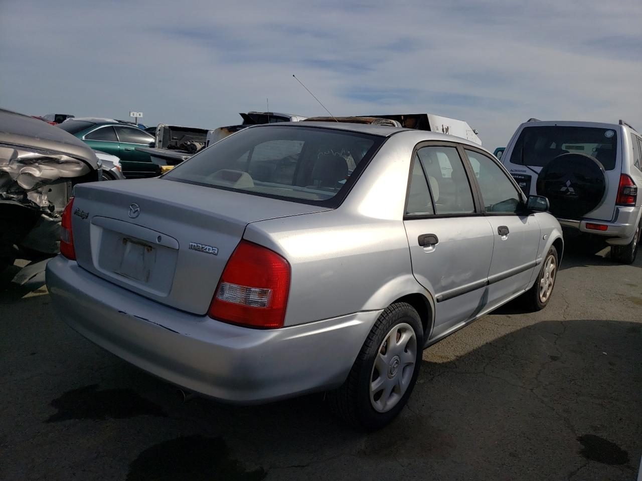 Photo 4 from auction – 2003 MAZDA PROTEGE with VIN JM1BJ225830130199