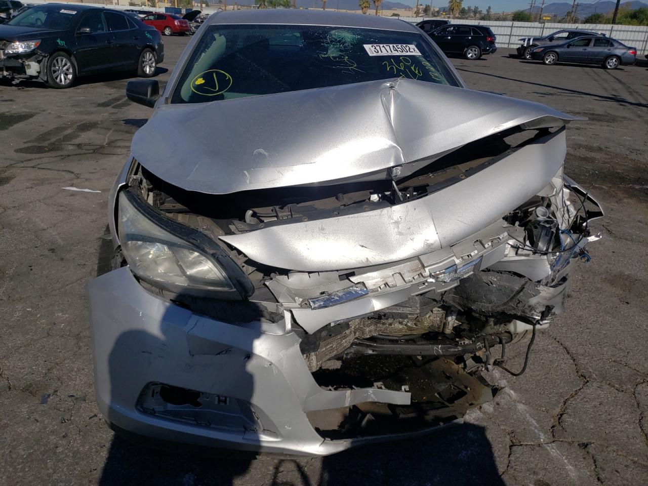 Photo 9 from auction – 2014 CHEVROLET MALIBU LS with VIN 1G11B5SL1EF186129