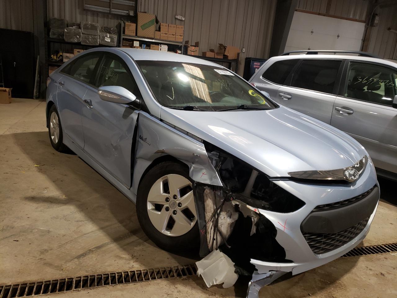 HYUNDAI SONATA HYB 2012 with VIN KMHEC4A48CA063170 - Photo from auction