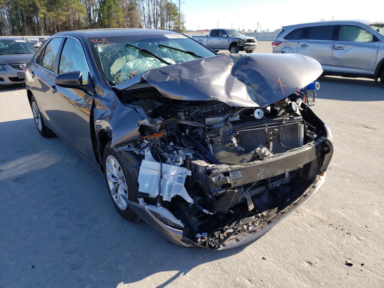 TOYOTA CAMRY LE 2017 with VIN 4T1BF1FK0HU780250 - Photo from auction