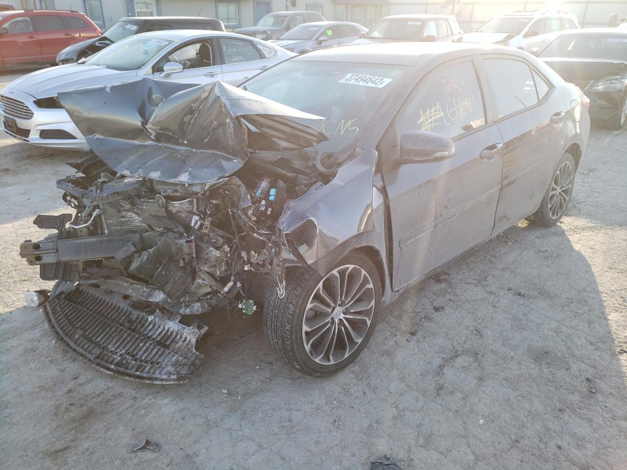 Photo 2 from auction – 2014 TOYOTA COROLLA L with VIN 5YFBURHE7EP176722
