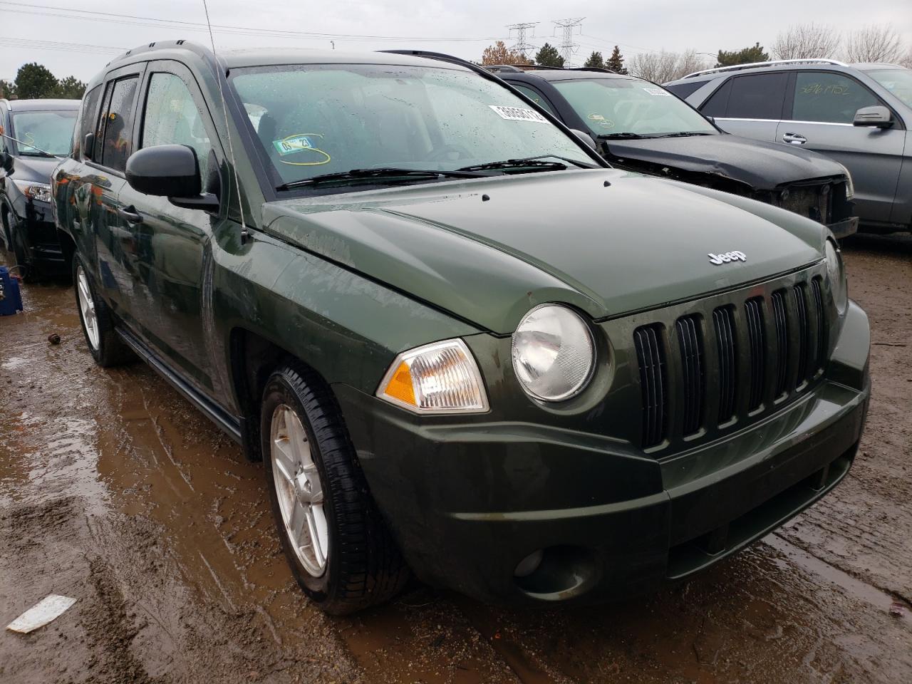 JEEP COMPASS 2007 with VIN 1J8FF47W27D180054 - Photo from auction