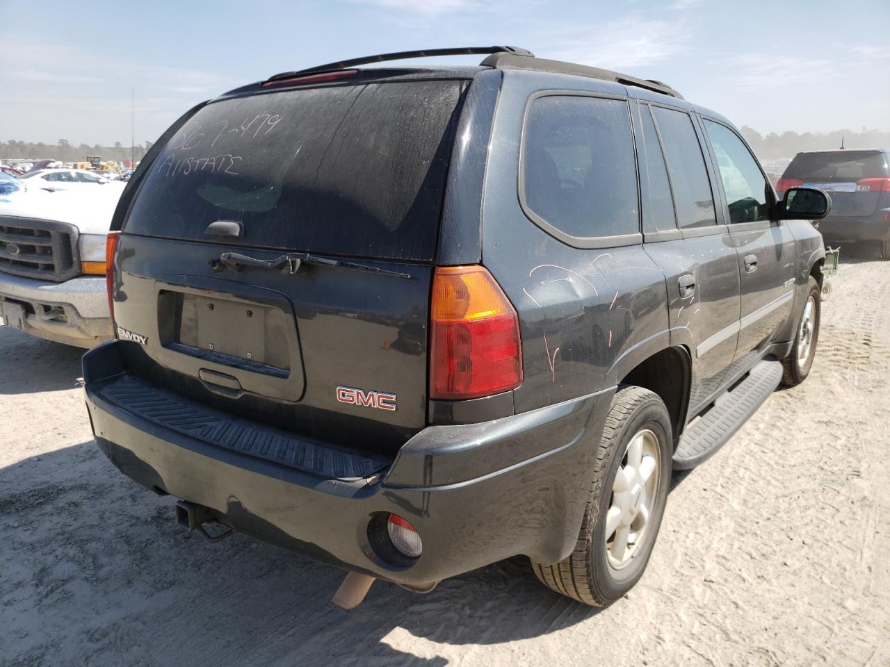 Photo 4 from auction – 2006 GMC ENVOY with VIN 1GKDS13S562151884